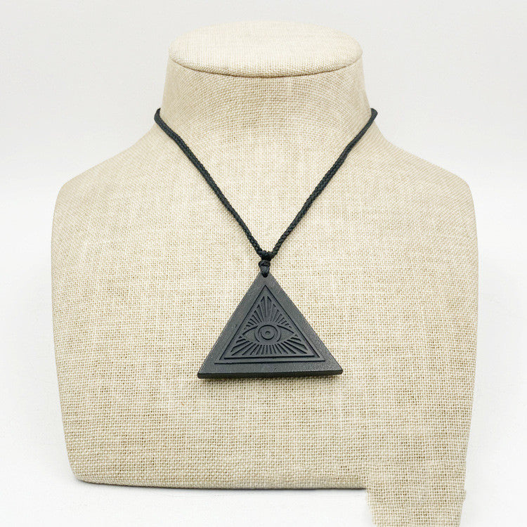 Triangular Pendant Carved In Rough Stone