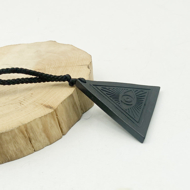 Triangular Pendant Carved In Rough Stone